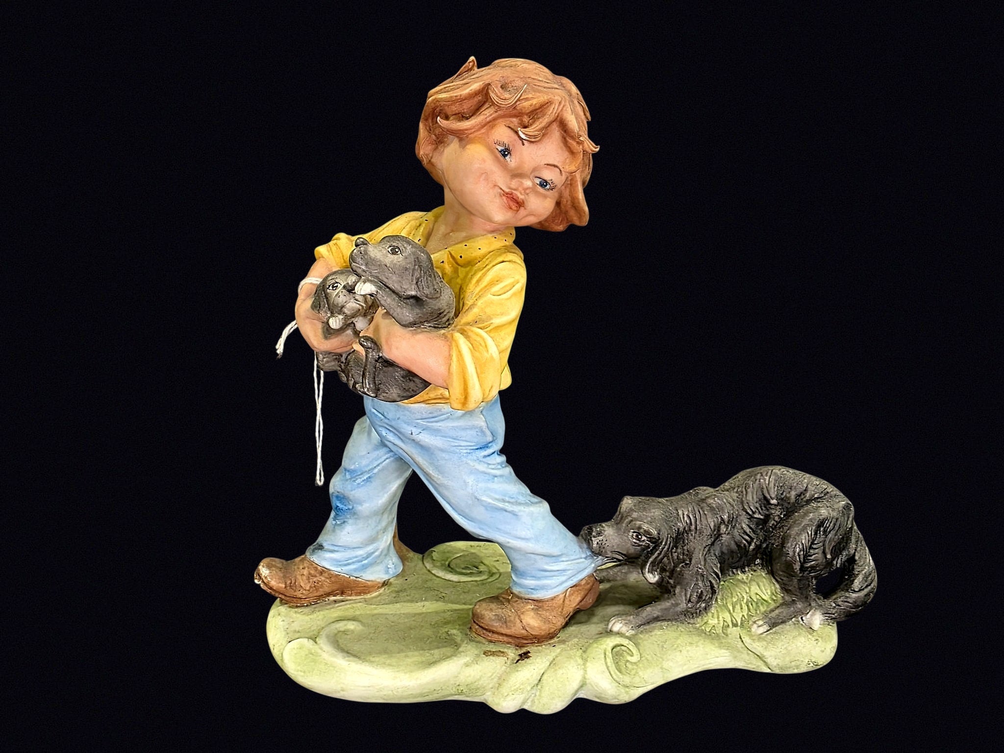 Bisque Porcelain Boy with Puppies Figurine