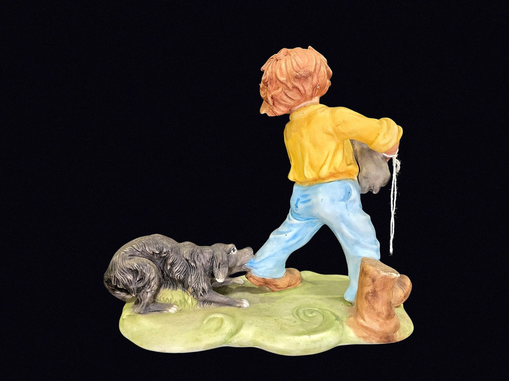Bisque Porcelain Boy with Puppies Figurine