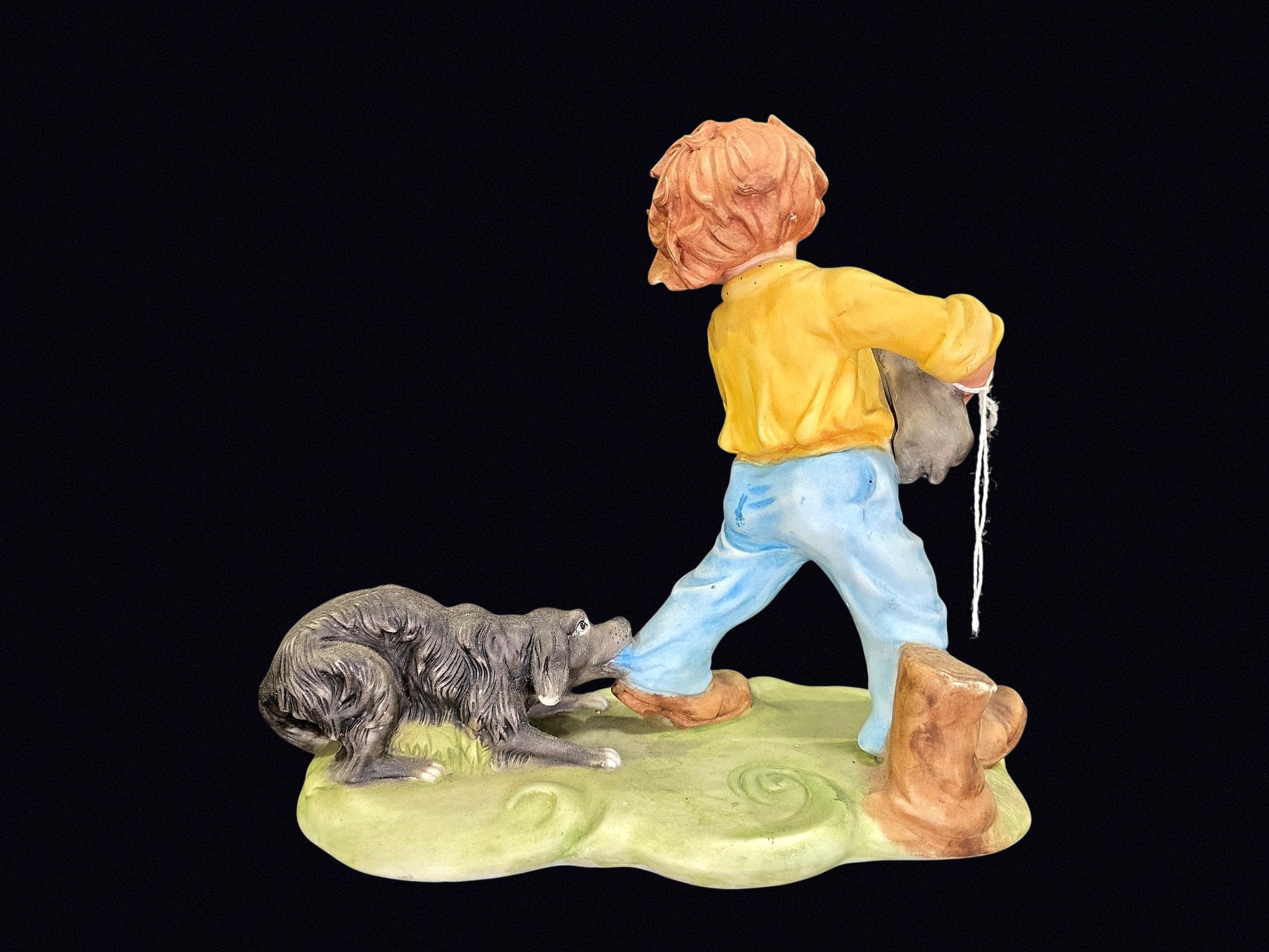 Bisque Porcelain Boy with Puppies Figurine