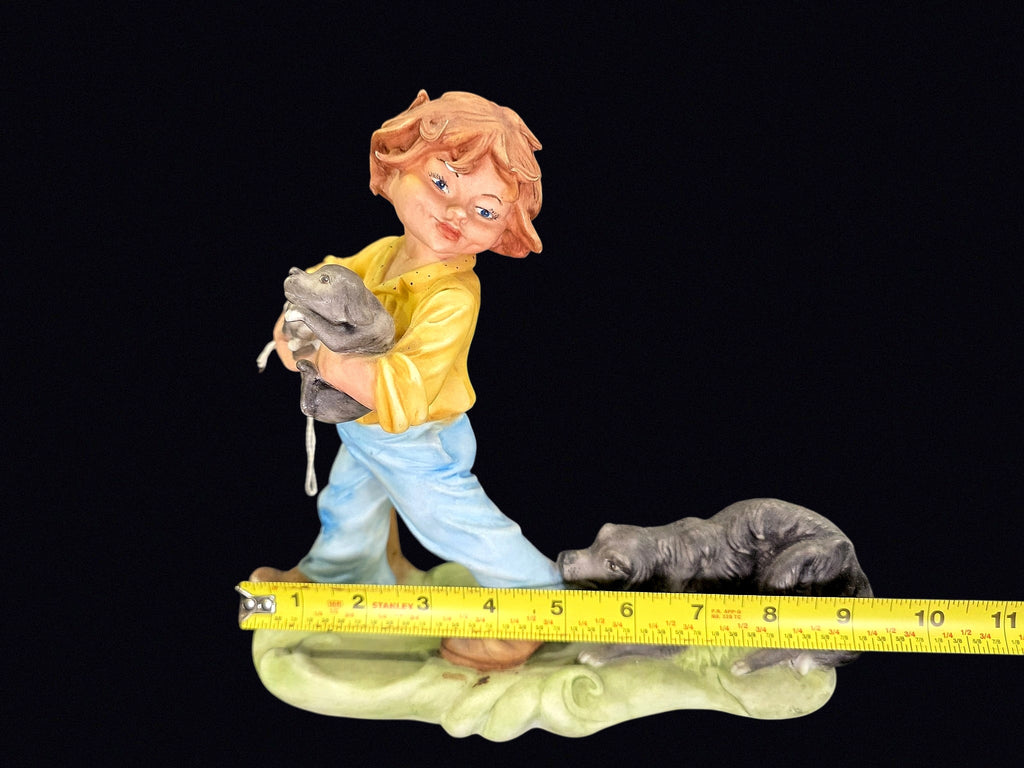 Bisque Porcelain Boy with Puppies Figurine