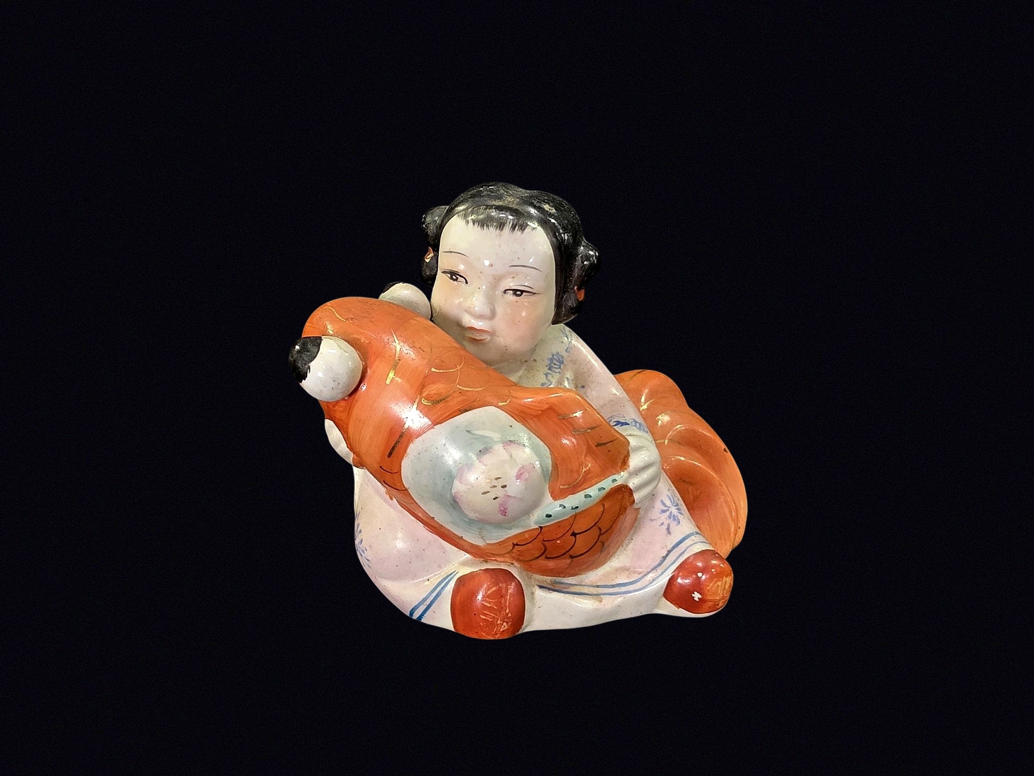 Chinese Porcelain Boy with Carp Figurine