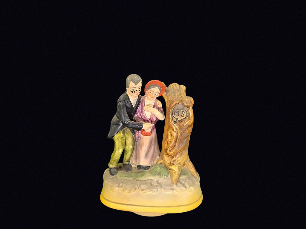 Bisque Porcelain Elderly Couple Music Box