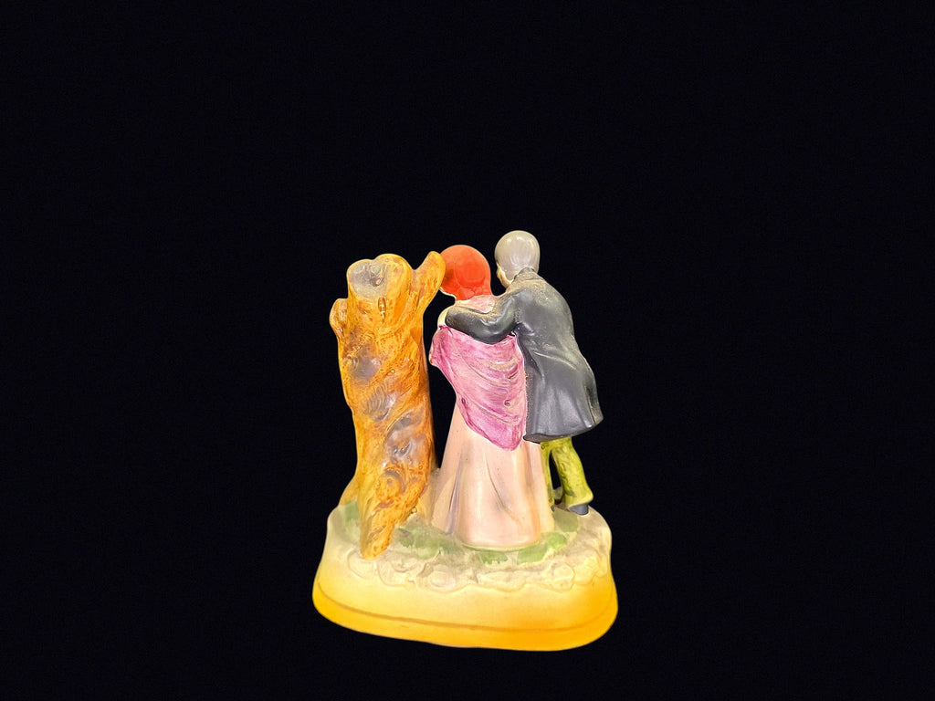 Bisque Porcelain Elderly Couple Music Box