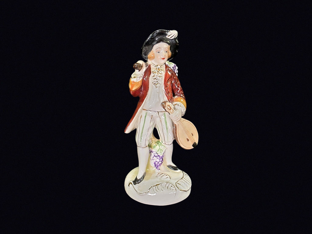 Japanese Porcelain Grape Harvester Figurine