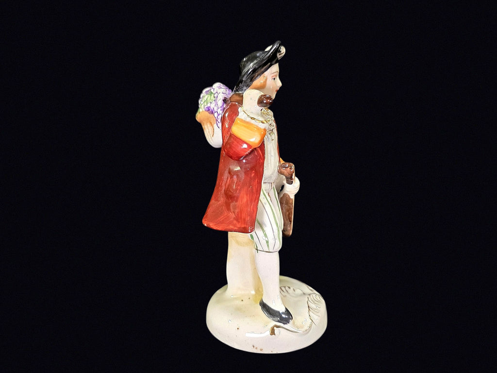 Japanese Porcelain Grape Harvester Figurine