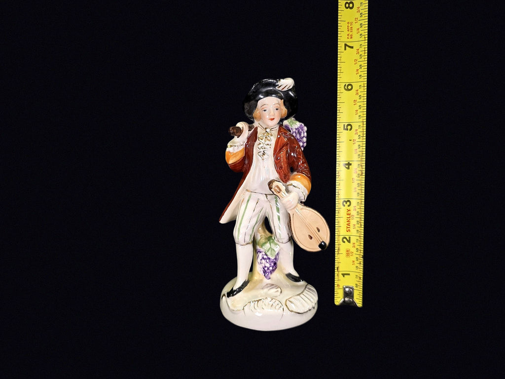 Japanese Porcelain Grape Harvester Figurine