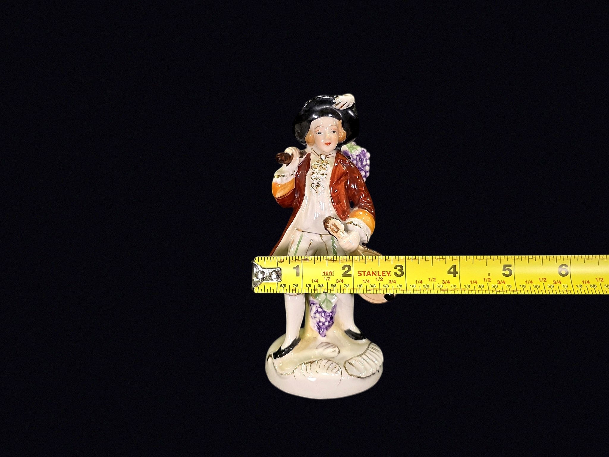 Japanese Porcelain Grape Harvester Figurine