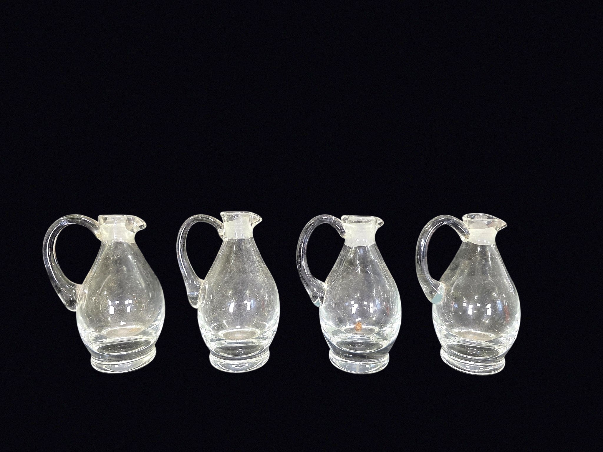 Four Mid-Century Glass Cruets Applied Handles