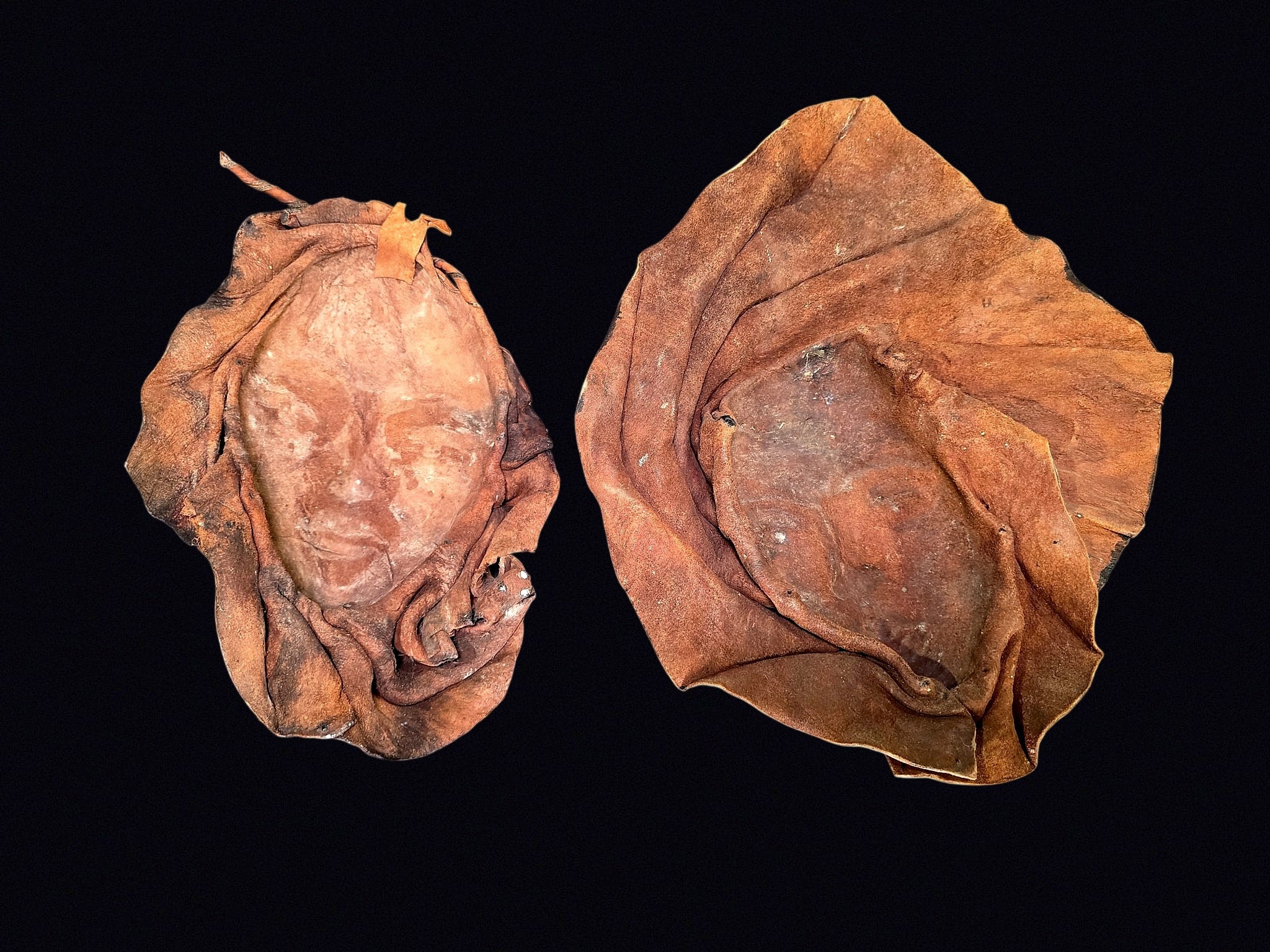 Caracas Tooled Leather Masks Pair Mid 20th C