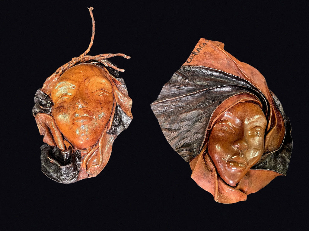 Caracas Tooled Leather Masks Pair Mid 20th C