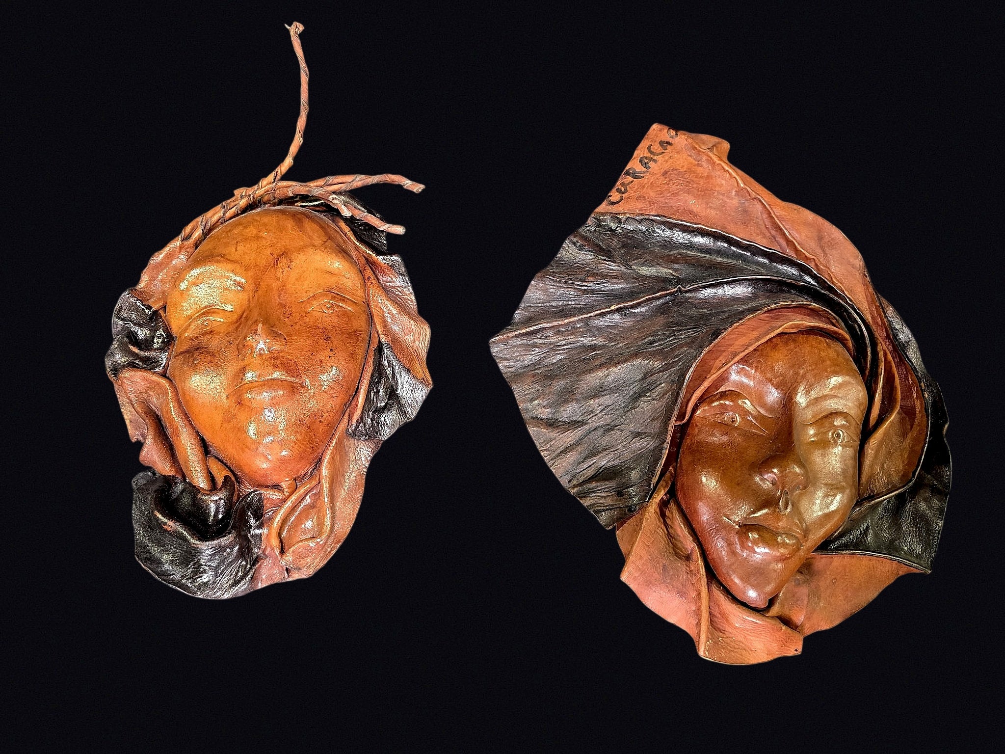 Caracas Tooled Leather Masks Pair Mid 20th C