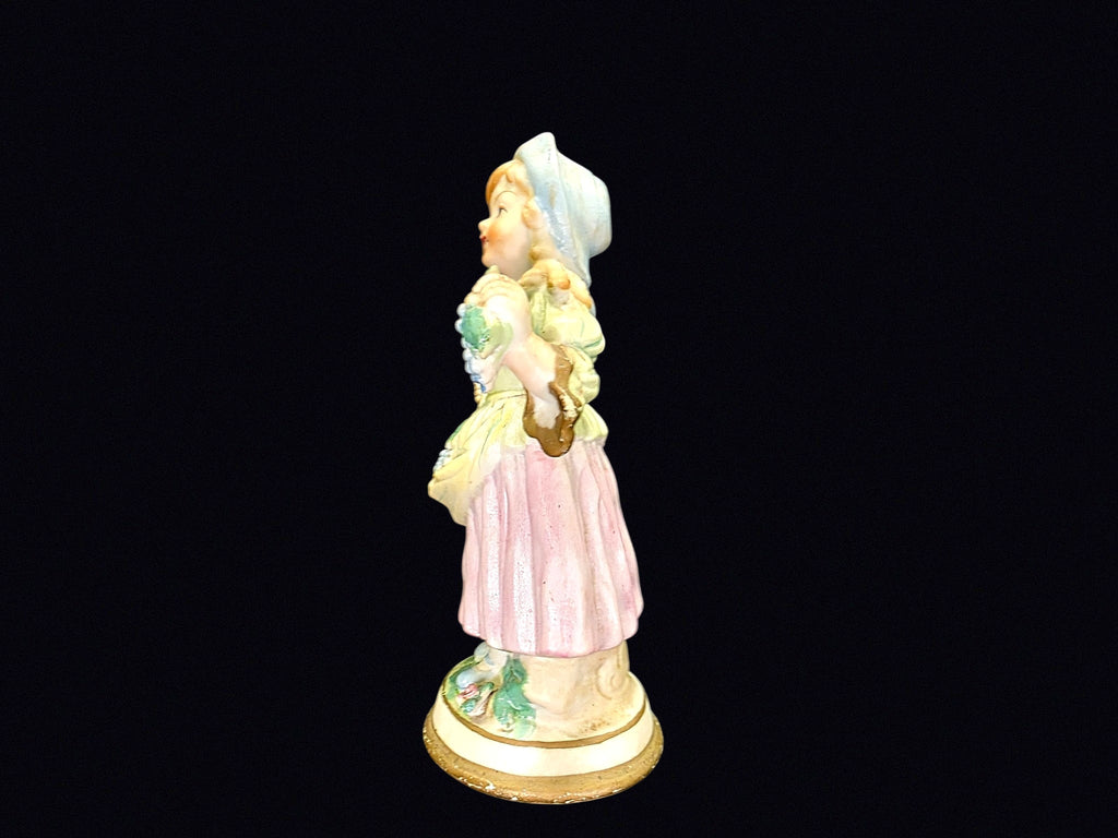Japan Bisque Girl with Grapes Figurine